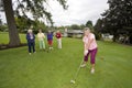Woman Teeing Off Royalty Free Stock Photo
