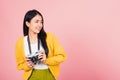 woman teen excited smiling holding vintage photo camera Royalty Free Stock Photo