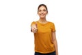 Woman or teenage girl in t-shirt showing thumbs up Royalty Free Stock Photo