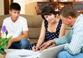 Woman with teenage son signing papers Royalty Free Stock Photo