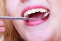 Woman teeth and dentist mouth mirror Royalty Free Stock Photo