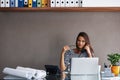 Woman, telephone and laptop at desk with call for discussion, conversation and talking to client. Receptionist, landline