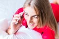 Woman telephoning on bed Royalty Free Stock Photo