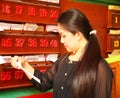 Woman in temple scene.