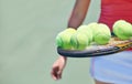Woman, tennis player and balls on racket for outdoor game, match or competition on court. Closeup or hands of female Royalty Free Stock Photo