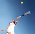 Woman tennis player with racket during a match game, isolated Royalty Free Stock Photo