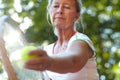 Woman, tennis racket and ball closeup for serve sport for workout, game play or match. Mature, female person and Royalty Free Stock Photo
