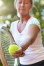 Woman, tennis racket and ready serve or ball on court for outdoor, competition or game match. Senior, female person and Royalty Free Stock Photo