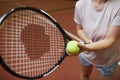 Woman with tennis racquet and ball Royalty Free Stock Photo