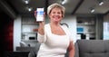 Woman Testing Glucose Level With Continuous Glucose Monitor