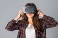 Woman testing a virtual reality helmet Royalty Free Stock Photo