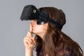 Woman testing a virtual reality helmet Royalty Free Stock Photo