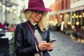 Woman texting on her smartphone