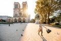 Woman on th esquare near Notre-Dame cathedral in Paris