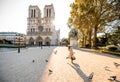 Woman on th esquare near Notre-Dame cathedral in Paris