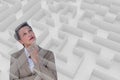 Woman thinking behind a maze Royalty Free Stock Photo