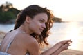 Woman, thinking with ocean view on beach and travel for wellness, fresh air and sunset on holiday in Bali. Reflection Royalty Free Stock Photo