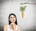 Woman thinking about reward Royalty Free Stock Photo