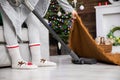 The woman thoroughly cleans the floor while vacuuming, even under the carpet. Royalty Free Stock Photo