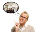 Woman with Thought Bubbles of a New Kitchen Design Royalty Free Stock Photo