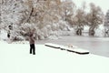 Woman training dogs in snow