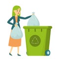 Woman throw garbage in a trash bin Royalty Free Stock Photo