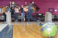 woman throwing bowling ball Royalty Free Stock Photo