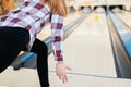 Woman throwing bowling ball Royalty Free Stock Photo