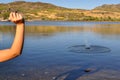 Woman Throwing a Stone