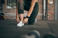 Woman, tie shoes and gym fitness exercise for sports wellness, training workout and runner cardio lifestyle. Athlete Royalty Free Stock Photo
