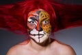 Woman with tiger face Royalty Free Stock Photo