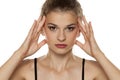 Woman tightening her face Royalty Free Stock Photo