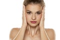 Woman tightening her face Royalty Free Stock Photo