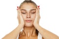 Woman tightening her face Royalty Free Stock Photo