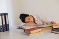 Woman tired of preparing for exam sleeps Royalty Free Stock Photo