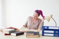 Woman tired work in the Office and reading books Royalty Free Stock Photo