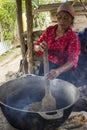 Monte Panina, IntibucÃÂ¡/Honduras.  July 6 2017. Indigenous lenca woman roasting coffee beans in a wood stove Royalty Free Stock Photo