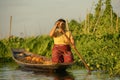 Woman with tomato harvest from floating garden on Inle lake