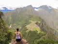 Woman at the top of Wayna Picchu mountain in Machu Picchu Royalty Free Stock Photo
