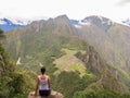 Woman at the top of Wayna Picchu mountain in Machu Picchu Royalty Free Stock Photo