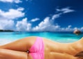 Woman topless on beautiful beach at Seychelles Royalty Free Stock Photo