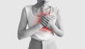 Woman touching chest. Heart attack, heart disease, and chest pain concept Royalty Free Stock Photo