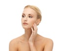 Woman touching her face skin Royalty Free Stock Photo