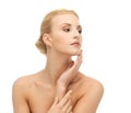 Woman touching her face skin Royalty Free Stock Photo