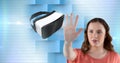 Woman touching and interacting with virtual reality headset with transition effect Royalty Free Stock Photo