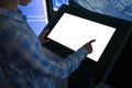 Woman touching interactive white blank touchscreen display kiosk at exhibition Royalty Free Stock Photo