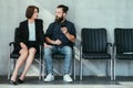 Woman touch man knee work harassment seduction Royalty Free Stock Photo