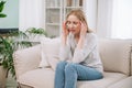 Woman touching temples and suffering from severe headache or migraine Royalty Free Stock Photo