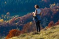 Woman tourist in autumn Carpathian mountain, Ukraine