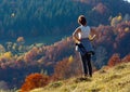 Woman tourist in autumn Carpathian mountain, Ukraine